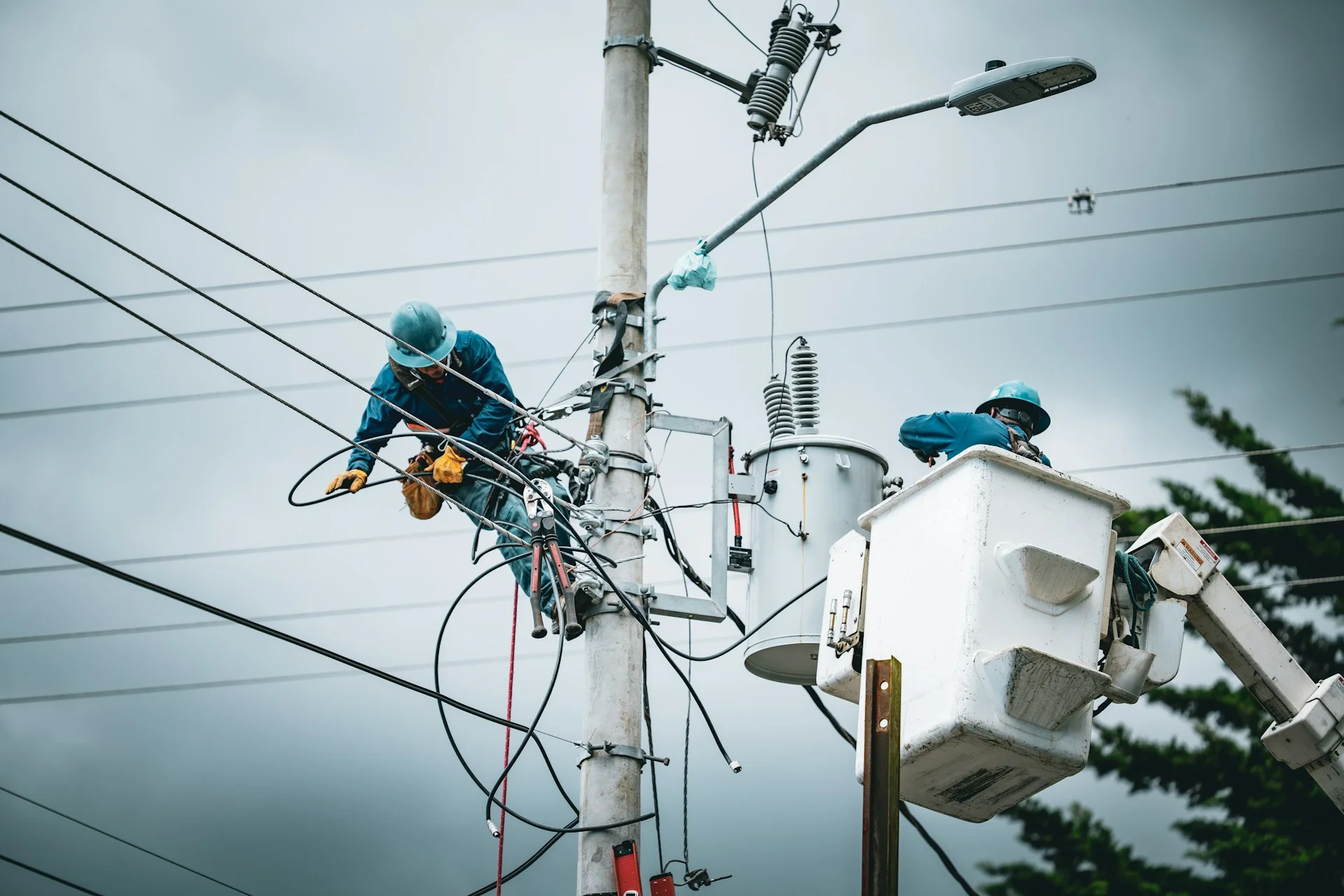 man working on power lines